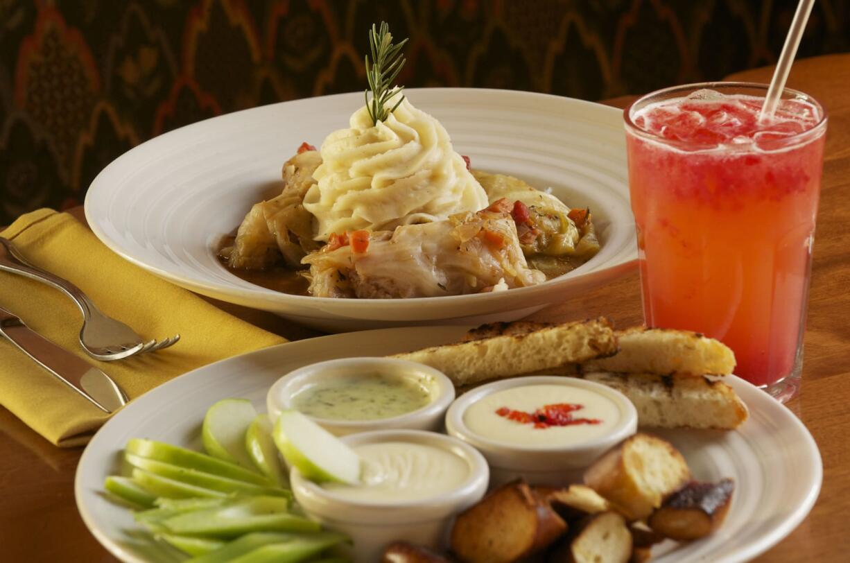 Cabbage rolls and mashed potatoes, with the fondue sampler, are on the menu at Gustav's in Vancouver.