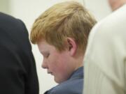 Quincy Tuttle, 11, makes his first appearance in Clark County juvenile court on Thursday on charges that stem from allegedly bringing a firearm, ammunition and knives to Frontier Middle School on Wednesday.