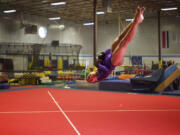 Gymnast Jordan Chiles, 11, trains on the floor exercise at Naydenov Gymnastics.