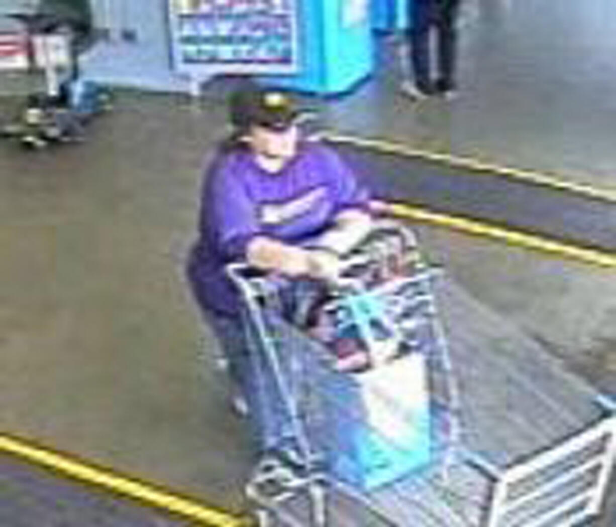 Surveillance video captured this woman snatching a purse April 2 from the Walmart off Mill Plain.