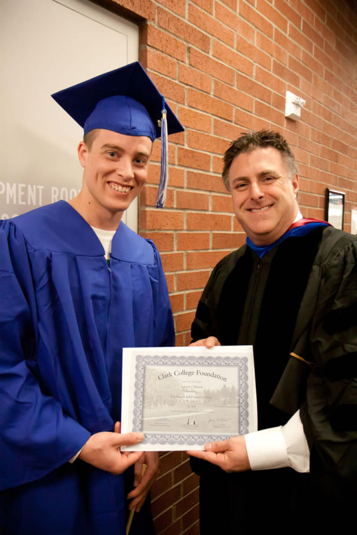 Central Park: Aaron Cliburn of Battle Ground received the Pat Fencl Scholarship, which he plans to use toward his goal of becoming a paramedic firefighter. At right is Dr.