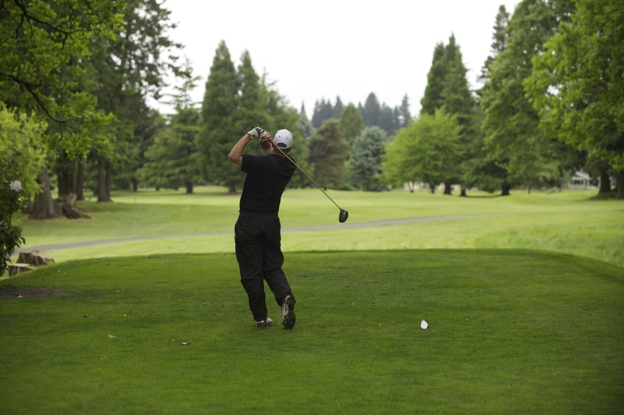 Teeing off at Club Green Meadows Golf Course.