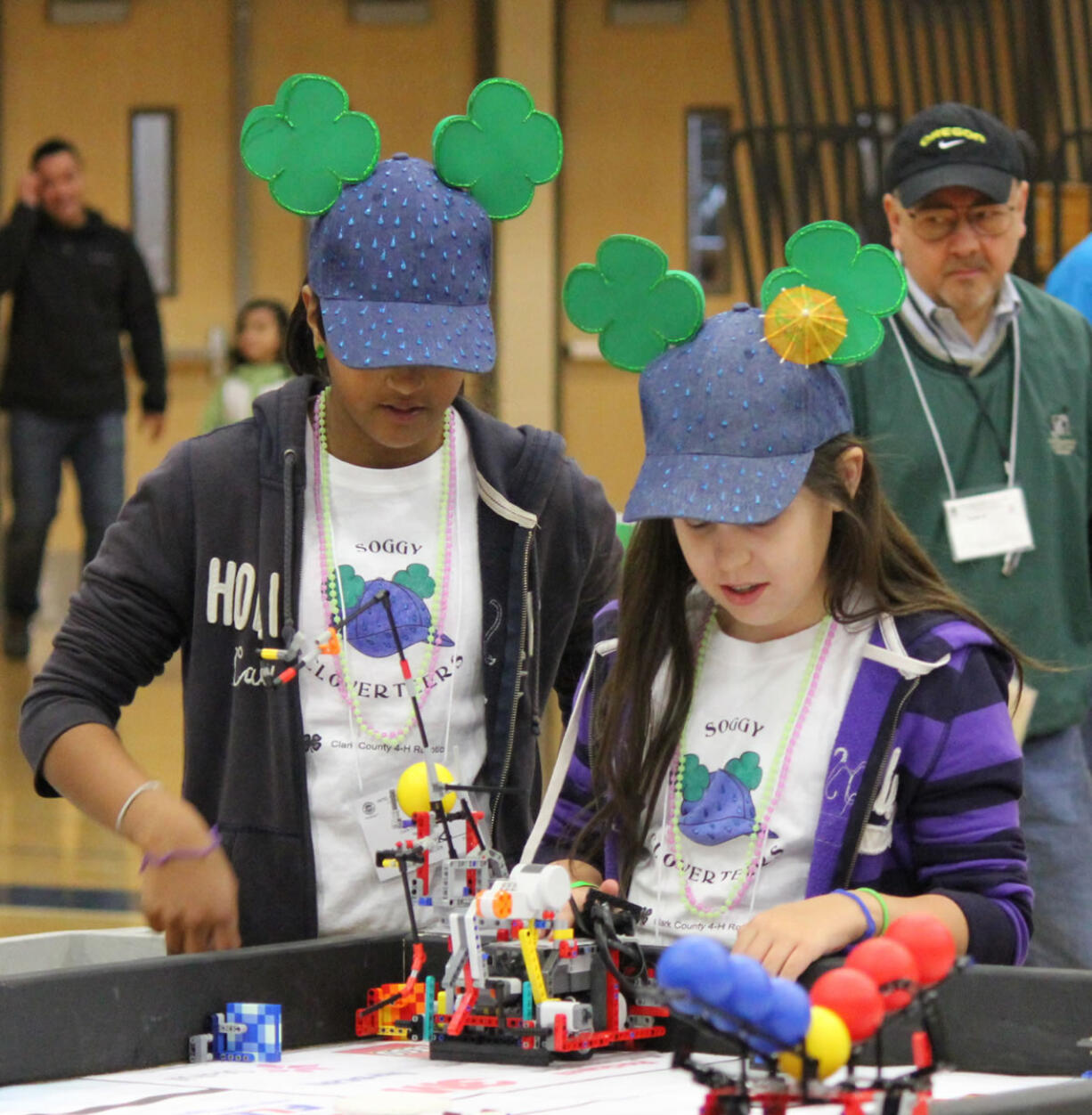 Battle Ground: Clark County 4-H Robotics Club members Nadia Khan, left, and Grace Fulfer. Their team, &quot;The Soggy Cloverteers,&quot; took a first place at the annual Intel Oregon FIRST LEGO League Championship Tournament on Jan.