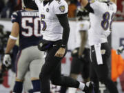 Baltimore Ravens quarterback Joe Flacco celebrates reacts following a touchdown pass to Anquan Boldin in the fourth quarter Sunday.