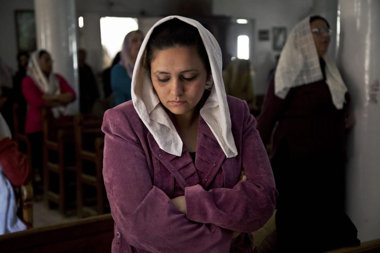 Egyptians celebrate mass in the Coptic Orthodox Church in Samalout, Minya, Egypt.