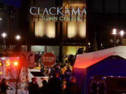 Police and medics work the scene of a multiple shooting at Clackamas Town Center Mall in Clackamas, Ore., Tuesday.