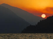 Smoke from a wildfire near White Salmon is visible from the Columbia River near Cascade Locks, Ore., on Thursday.