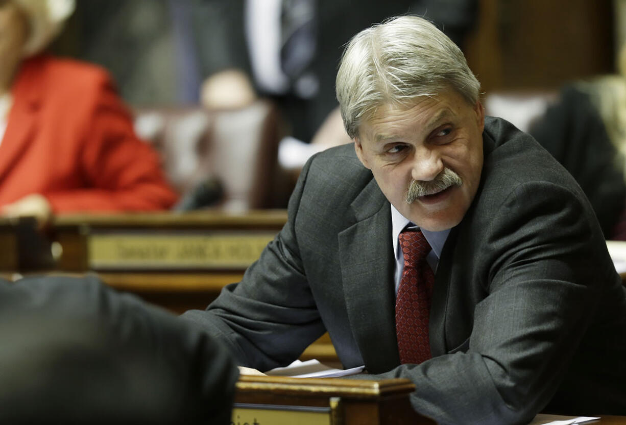 Sen. Tim Sheldon, D-Potlatch, sits at his desk on the Senate floor Jan. 14 at the Capitol in Olympia. Sheldon and fellow Democrat Rodney Tom currently side with Republicans in the Senate leading to questions as to whether the Reproductive Parity Act, as it is known to supporters, has enough votes to pass.