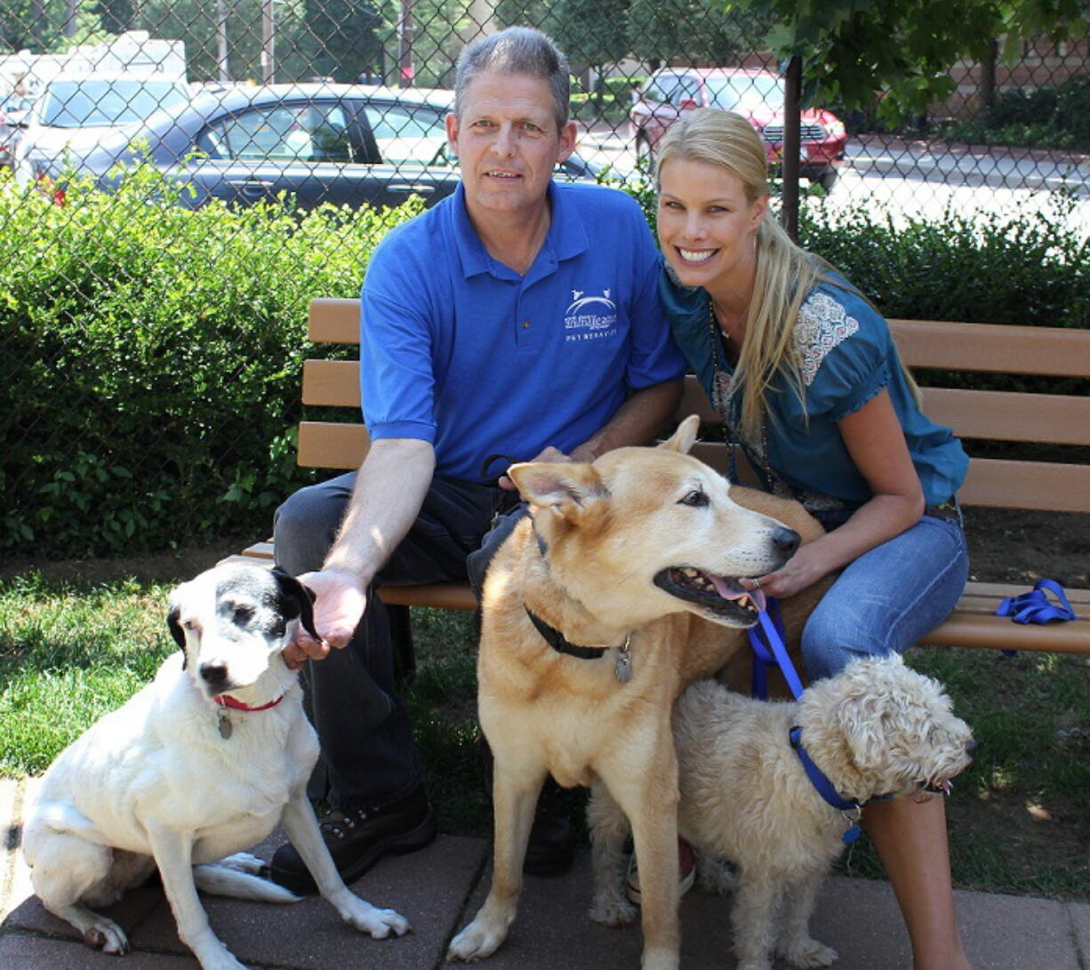 North Shore Animal League America
If the Dalmatian mix, shepherd Husky mix, and Benji-like dog with shelter personnel in Port Washington, N.Y., are adopted, it will be together, as their ailing owner wants.