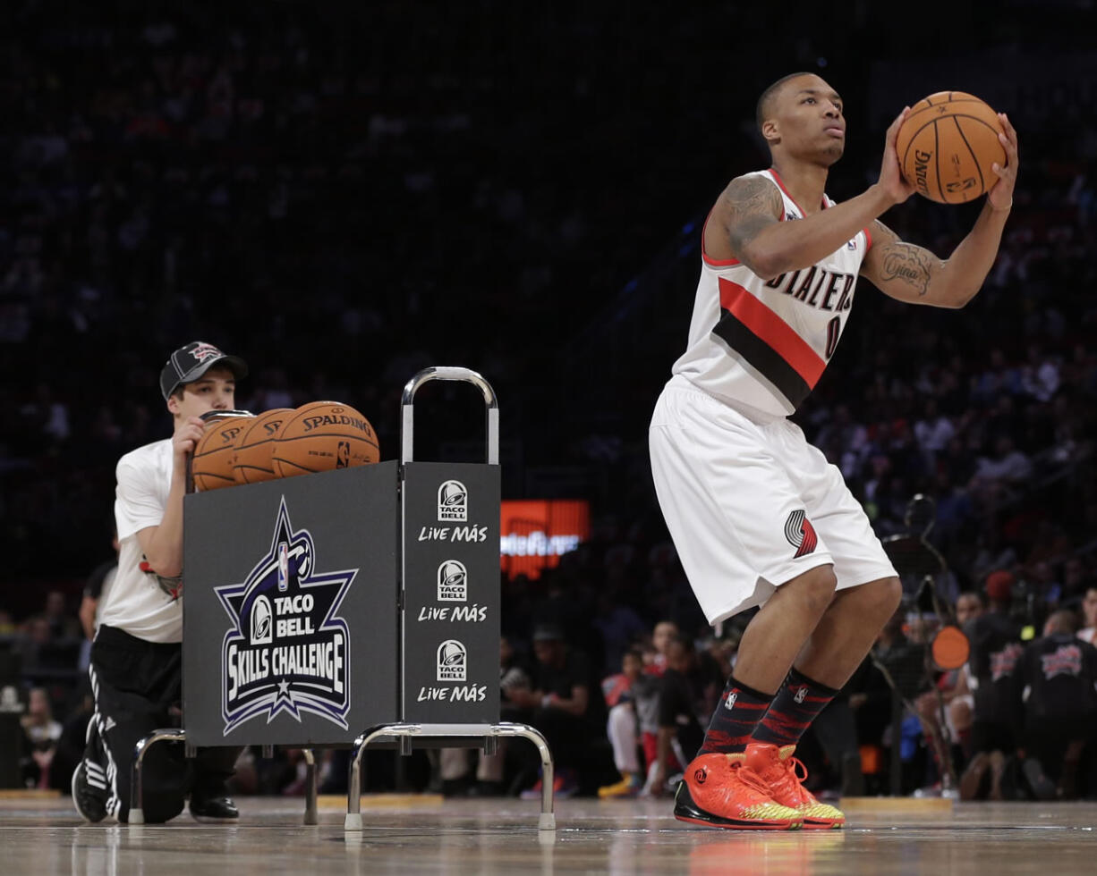 Damian Lillard of the Portland Trail Blazers participates in the skills challenge during NBA basketball All-Star Saturday Night in Houston.