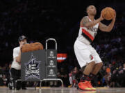 Damian Lillard of the Portland Trail Blazers participates in the skills challenge during NBA basketball All-Star Saturday Night in Houston.