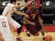 Arizona State guard Chris Colvin (2) drives around Washington State guard Dexter Kernich-Drew, left, during the second half of an NCAA college basketball game, Thursday, Jan. 31, 2013, in Pullman, Wash. Arizona State won 63-59.