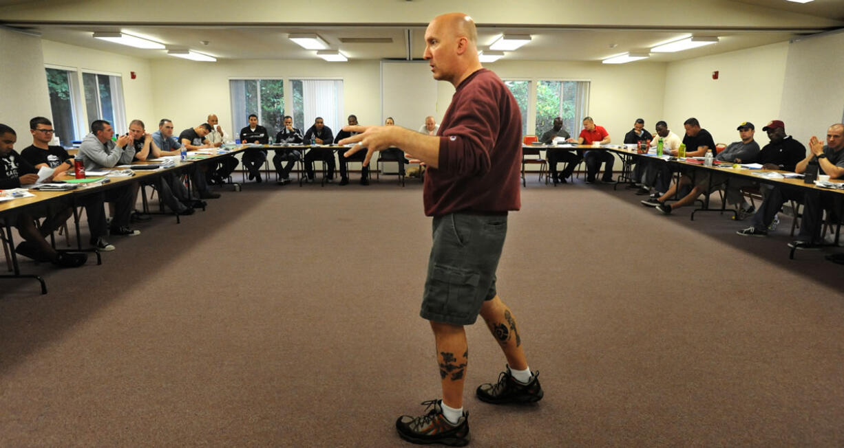 Dr. Glen Wurglitz teaches lower-ranking officers and NCOs during training on good overall health at the Soldier 360 retreat Wednesday in Lacey.