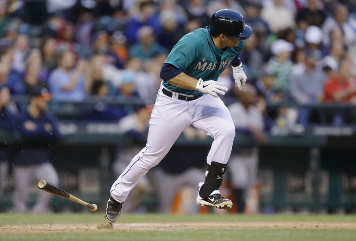 Seattle Mariners Mike Zunino runs for first base but grounded out in the sixth inning of a baseball game against the Houston Astros, Wednesday, June 12, 2013, in Seattle. (AP Photo/Ted S.