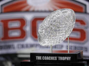 The Coaches' Trophy is displayed before the BCS National Championship game between the LSU and Alabama in New Orleans in January. College football will finally have a playoff.