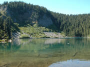 Blue Lake is 12 acres and stocked with cutthroat trout. It is at the junction of Thomas Lake trail No. 111 and the Pacific Crest National Scenic Trail No.