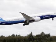 A Boeing 787-9 takes off on a first flight of the new aircraft Tuesday at Paine Field in Everett, Wash. Boeing spokeswoman Kate Bergman says the 787-9 is 20 feet longer and can seat 40 more passengers than the original 787-8, which carries between 210 and 250 passengers.