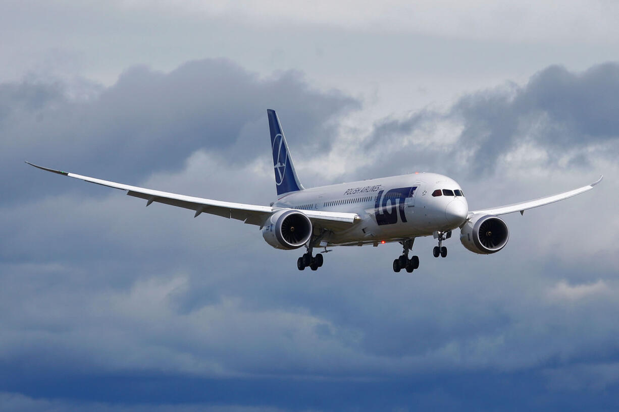 A Boeing-owned 787 production plane built for LOT Polish Airlines lands after a demonstration flight meant to be the final certification test for the 787's new battery system at Paine Field in Everett, Wash., Friday, April 5, 2013.  Boeing called the flight &quot;the final certification test for the new battery system.&quot; The next step will be for the Federal Aviation Administration to decide whether Boeing's battery fix is good enough for airlines to safely fly it again. The test was &quot;to demonstrate that the new system performs as intended during normal and non-normal flight conditions,&quot; Boeing spokesman Marc Birtel said. The 787 Dreamliner has been grounded since mid-January because of smoldering batteries, including a fire on the ground in Boston. Boeing has designed what it says is a fix, including more heat insulation and a battery box designed so that any meltdown of the lithium-ion battery will vent the hot gases outside of the plane.