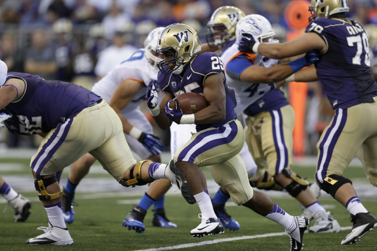 Washington's Bishop Sankey runs the ball against Boise State in the first half Saturday.