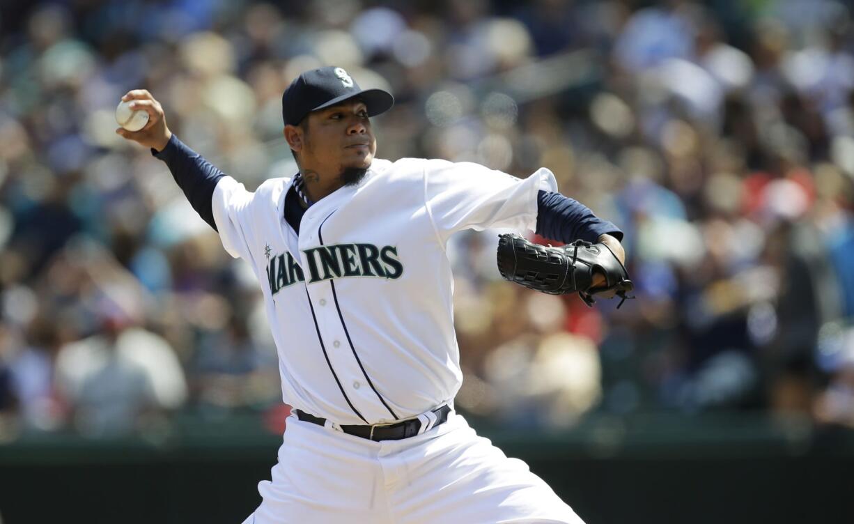 Seattle starter Felix Hernandez pitched eight innings, struck out nine and allowed four hits as the Mariners beat Milwaukee 2-0 on Sunday.