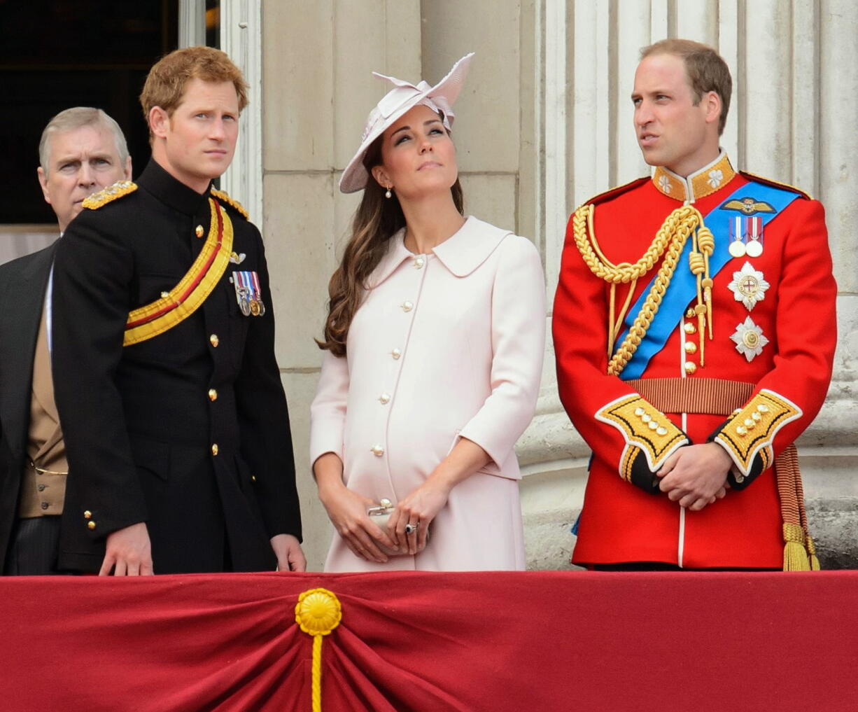 Britain's Prince Harry, left, Kate, Duchess of Cambridge, center, and Prince William, on the balcony of Buckingham Palace, on June 15 during the Trooping The Colour parade, in London.