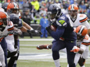 Seattle Seahawks' Derrick Coleman runs with the ball against the Cleveland Browns in the first half of an NFL football game, Sunday, Dec. 20, 2015, in Seattle. (AP Photo/Ted S.