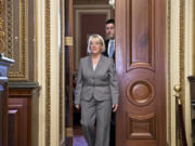 Senate Budget Committee Chair Patty Murray, D-Wash., front, and House Budget Committee Chairman Paul Ryan, R-Wisc., rear,  emerge from an initial meeting of the bipartisan budget conferees from both houses of Congress on Oct.