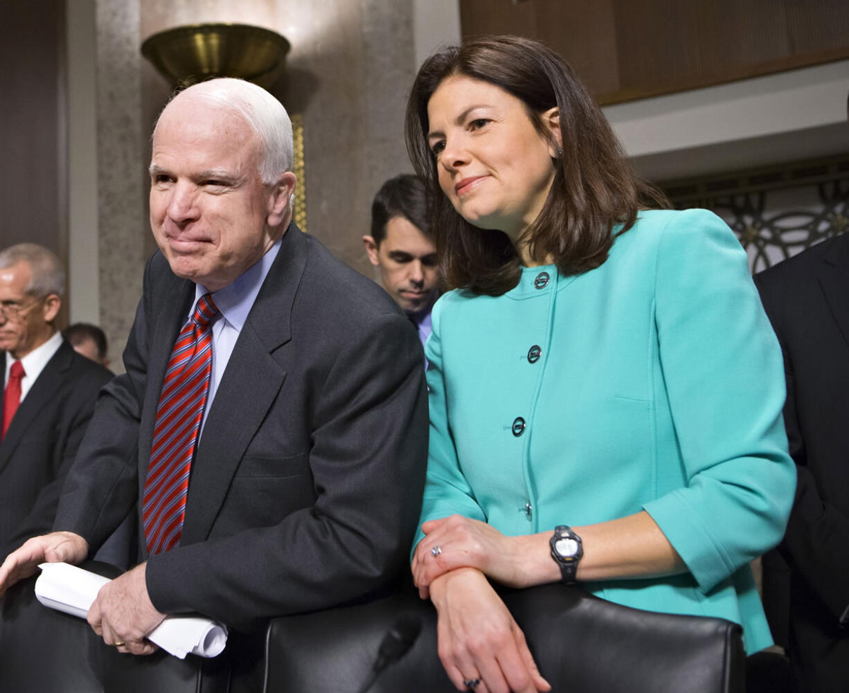 Sen. John McCain, R-Ariz., left, and Sen.