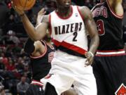 Portland's Wesley Matthews (2) looks to pass against Chicago defender Joakim Noah during the second half Sunday.