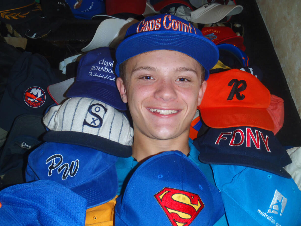 Lynne Gambone/Associated Press
Lynne Gambone's son Tyler Cohen, seen in Albertson, N.Y., founded a charity, Caps Count, which distributes donated caps to poor kids in the U.S. and orphanages around the world. He is among thousands of kids who do more than the usual crafts, sports and swimming at day and overnight camps.