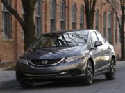 Associated Press files
In a new survey of U.S. car owners, Honda had the top-performing small car with the Honda Civic.