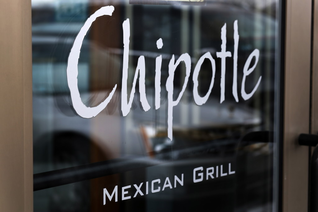 Chipotle says it is tightening its food safety standards after its restaurants were linked to dozens of cases of E. coli. (AP Photo/Gene J.