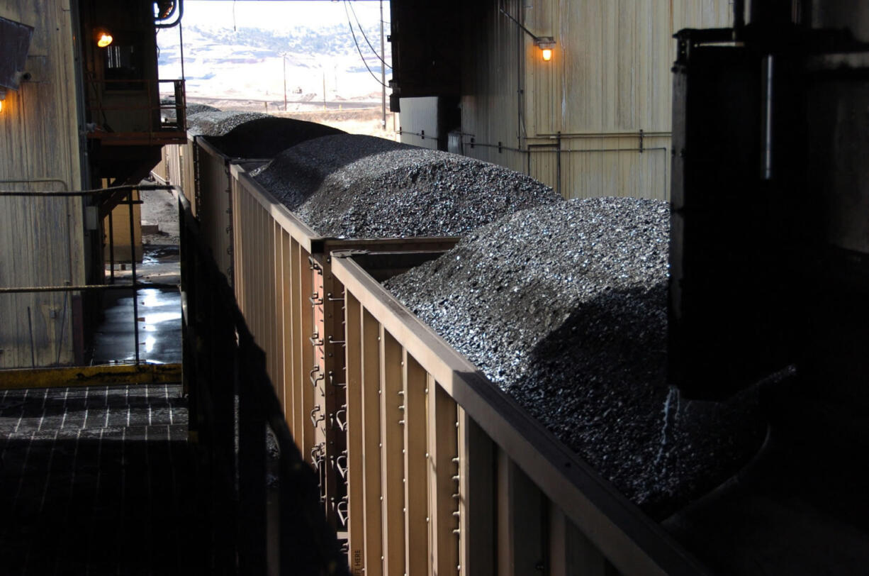 Coal passes through a loading terminal at Cloud Peak Energy's Spring Creek mine near Decker, Mont.