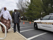 Members of the congregation arrive Friday at the All Dulles Area Muslim Society Center in Sterling, Va.