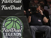 FanDuel advertising covers the post for an NCAA college basketball matchup in the FanDuel Legends Classic consolation game Nov. 24 at the Barclays Center in New York. A state judge has barred daily fantasy sports sites DraftKings and FanDuel from doing business in New York. The order issued Friday by state Supreme Court Justice Manuel Mendez also denied the country&#039;s two biggest daily fantasy sports sites&#039; attempts to block the state?s attorney general enforcement action.