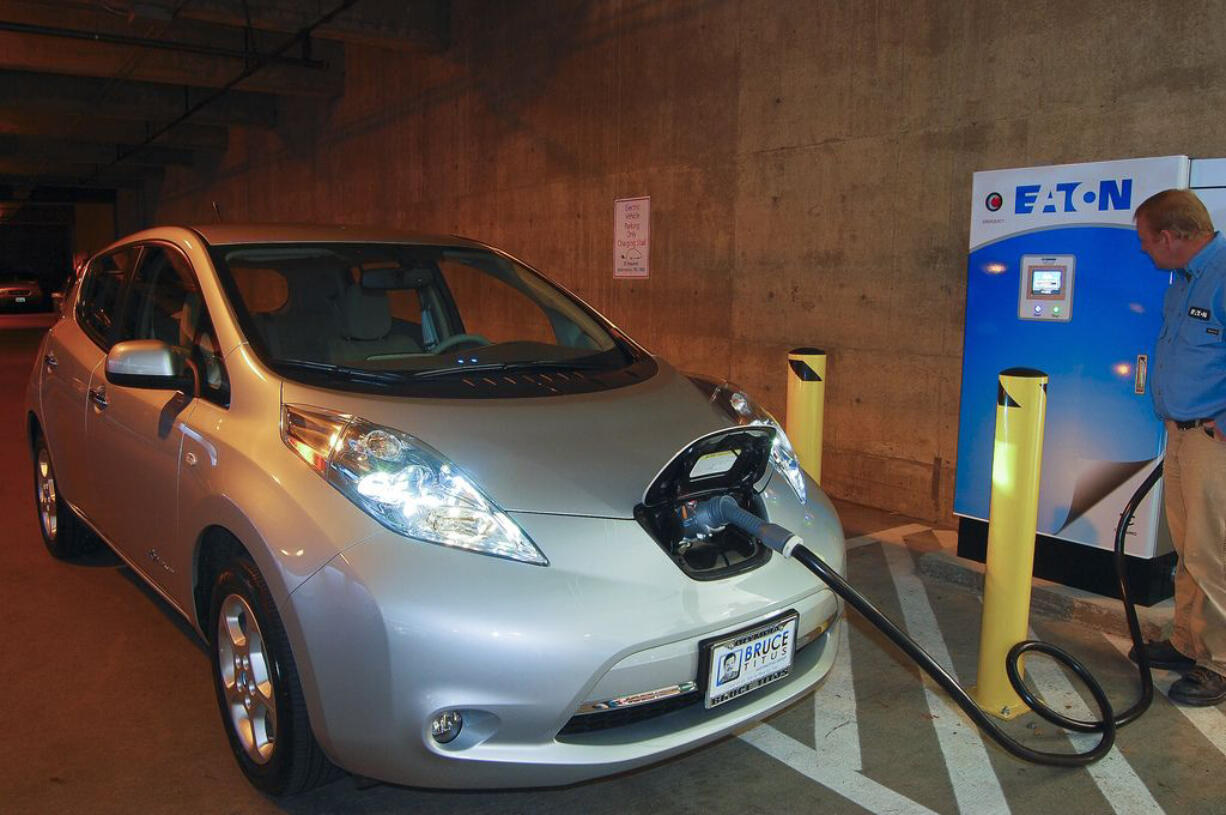 An electric car being recharged.