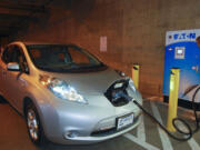 An electric car being recharged.