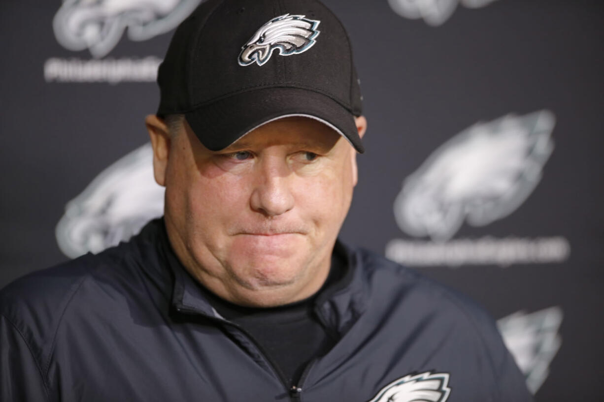 Philadelphia Eagles coach Chip Kelly listens to a question during a news conference Monday. Kelly was fired on Tuesday.