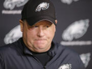 Philadelphia Eagles coach Chip Kelly listens to a question during a news conference Monday. Kelly was fired on Tuesday.