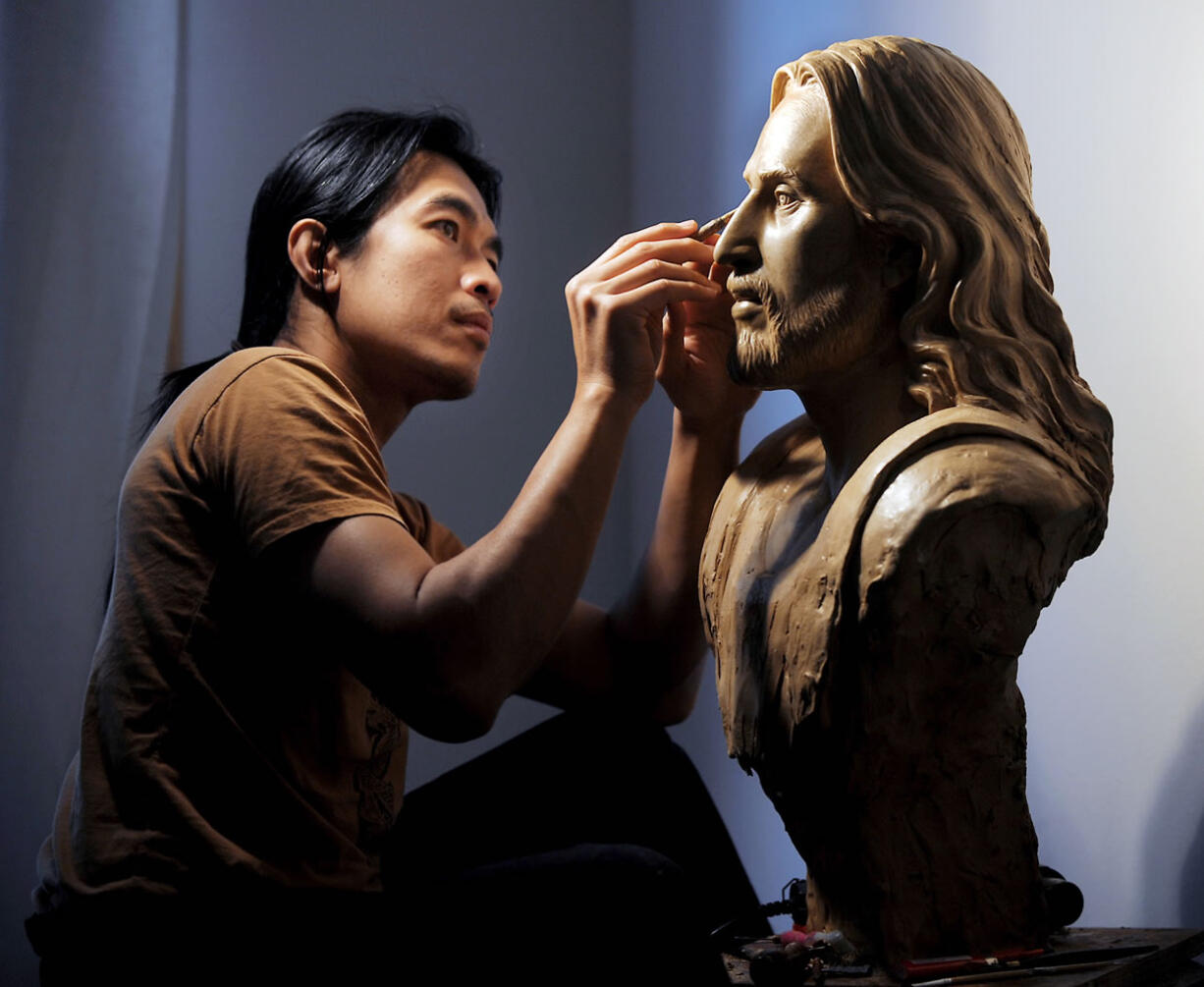 Sunti Pichetchaiyakul of Bigfork, Mont., works in his studio in 2011 on a wax sculpture of Jesus Christ based on the Shroud of Turin. For 2,000 years, Jesus Christ has been worshipped and adored, and yet nobody really knows the face of Jesus.