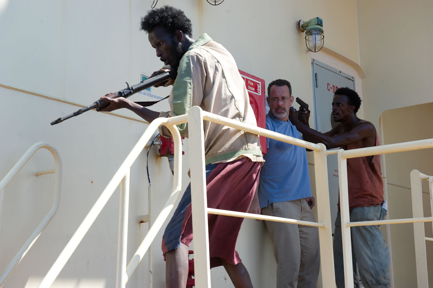 Mahat Ali, from left, Tom Hanks and Faysal Ahmed star in &quot;Captain Phillips.&quot;