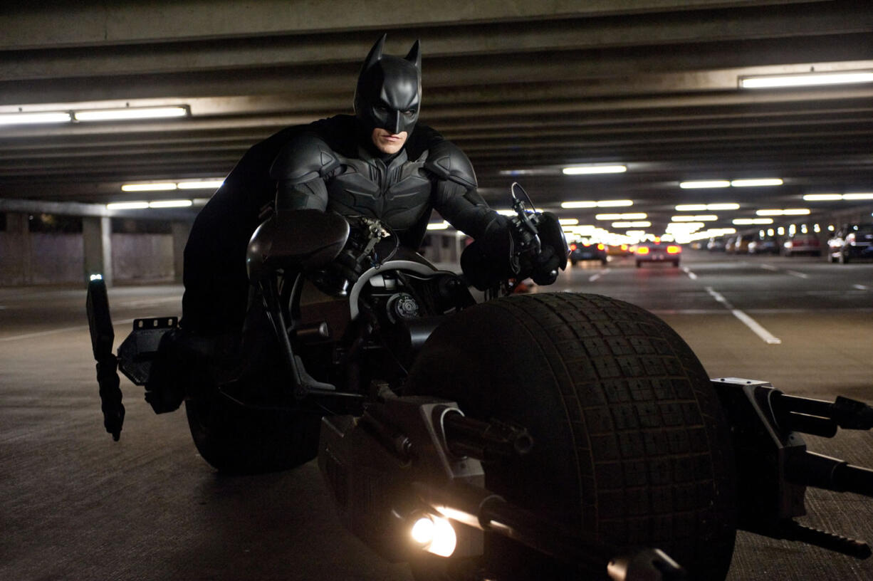 This undated film image released by Warner Bros. Pictures shows Christian Bale as Batman in a scene from the action thriller &quot;The Dark Knight Rises.&quot; (AP Photo/Warner Bros.