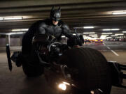 This undated film image released by Warner Bros. Pictures shows Christian Bale as Batman in a scene from the action thriller &quot;The Dark Knight Rises.&quot; (AP Photo/Warner Bros.