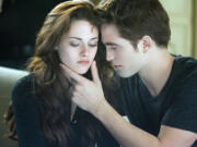 Kristen Stewart, left, and Robert Pattinson in a scene from &quot;The Twilight Saga: Breaking Dawn Part 2.&quot;