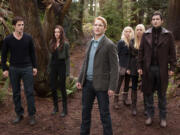 Robert Pattinson, from left, Kristen Stewart, Peter Facinelli, MyAnna Buring, Casey LaBow and Christian Camargo in a scene from &quot;The Twilight Saga: Breaking Dawn Part 2.&quot;