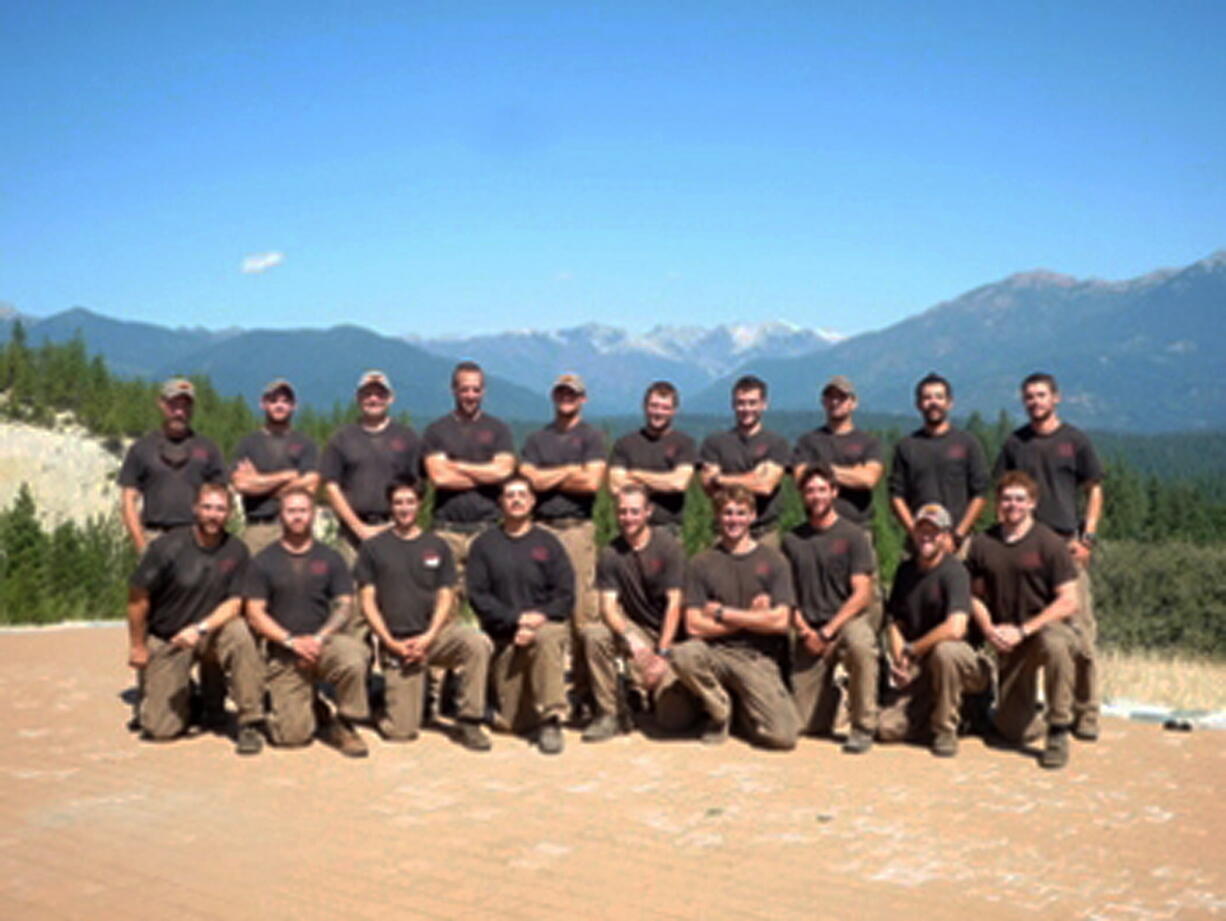 Unidentified members of the Granite Mountain Interagency Hotshot Crew from Prescott, Ariz., pose together in this undated photo provided by the City of Prescott. Some of the men in this photograph were among the 19 firefighters killed while battling an out-of-control wildfire near Yarnell, Ariz., on Sunday, according to Prescott Fire Chief Dan Fraijo.