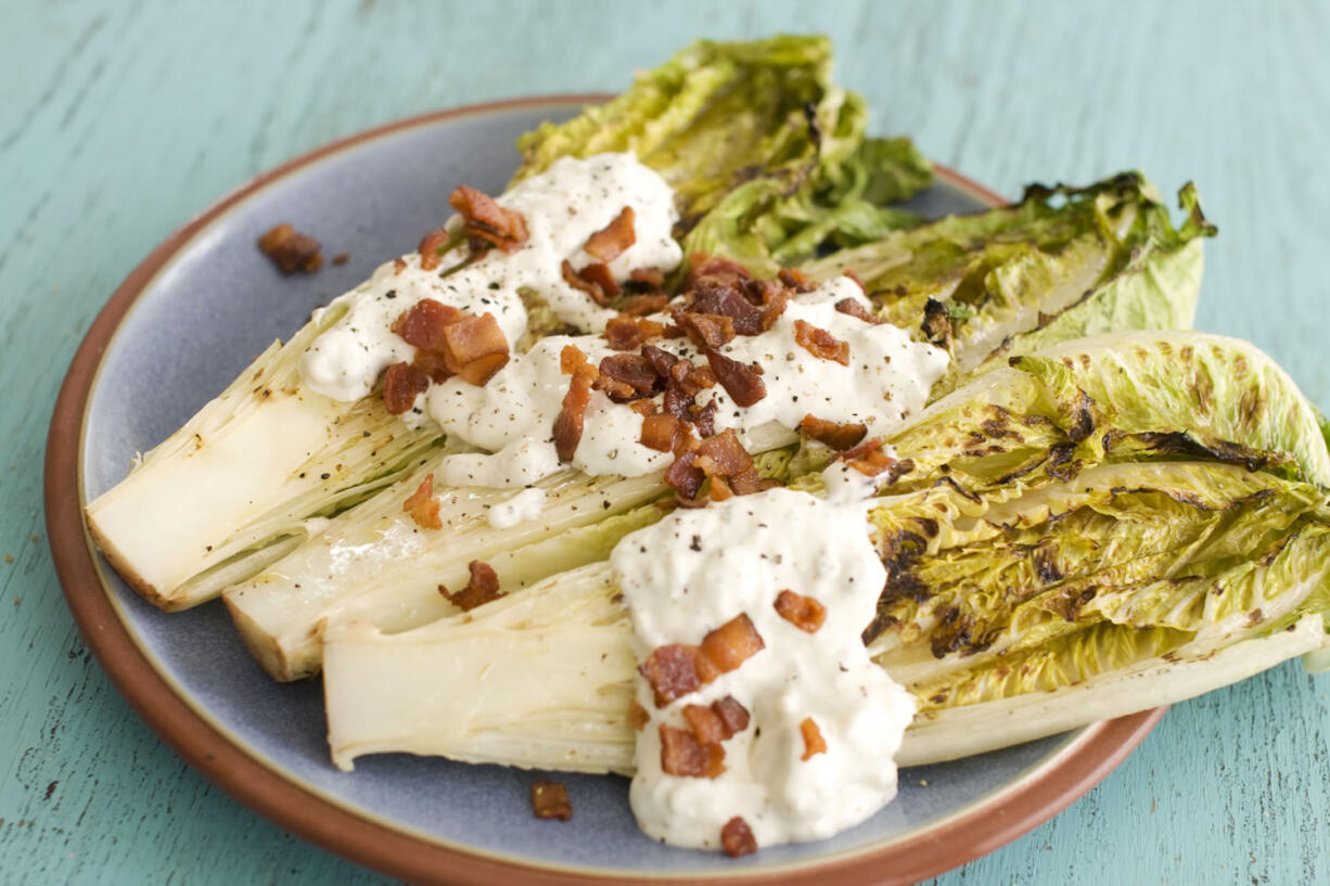 Grilled hearts of romaine with blue cheese dressing.