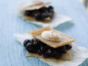 Crisp Blueberry Shortcakes are prepared with three layers of baked phyllo dough cut into squares.