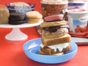 Front, from top down, black and red, double chocolate, and shortcake ice cream sandwiches buffet