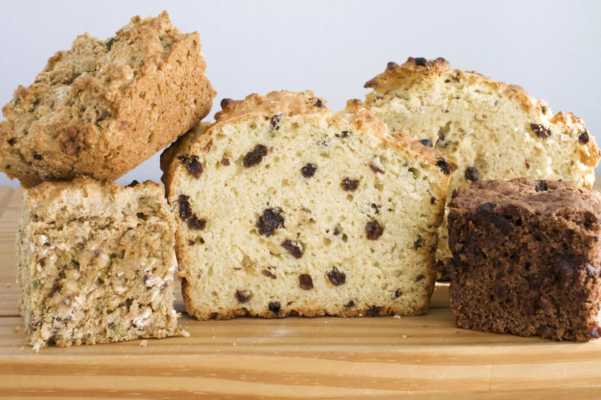 3 variations: Oatmeal-rye soda bread with herbs and walnuts, from left, Irish soda bread, and double chocolate cherry soda bread.